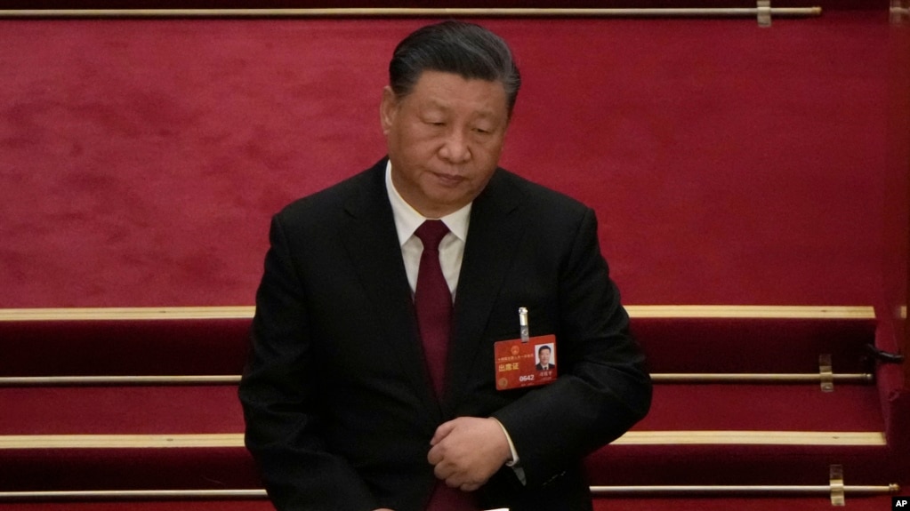 2023 年 3 月 5 日，中国国家主席习近平出席在北京人民大会堂举行的全国人民代表大会开幕式。（美联社照片/Ng Hanguan）