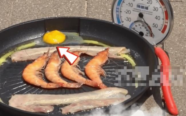 郑州路面超摄氏72度? 路面煎蛋烤虾全熟 郑州路面超摄氏72度? 路面煎蛋烤虾全熟